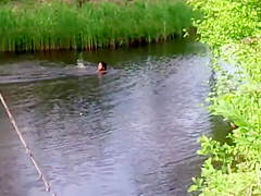 Chubby Brazilian chick takes a quick swim in the local river