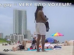 Two naked goddesses on the beach of Miami