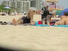 Two naked goddesses on the beach of Miami