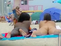 Two naked goddesses on the beach of Miami