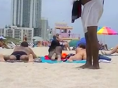 Two naked goddesses on the beach of Miami