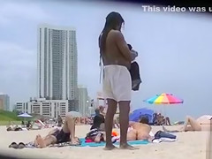 Two naked goddesses on the beach of Miami