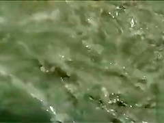 Beautiful bare girls pose for photos at the beach