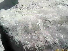 Nudist camp at the lake with lots of men and women