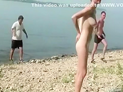 Nude teen with beautiful body by the lake