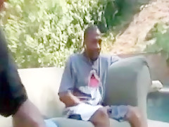 Sucking bbc in the  pool