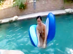 Sucking bbc in the  pool