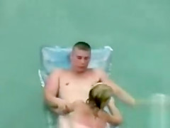 Naked couple floats in the ocean and fucks on the beach