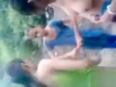 Naked Indian amateur teen swims in the river