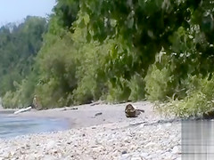 Stroking the penis on the coast