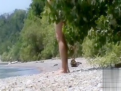 Stroking the penis on the coast