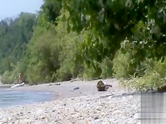 Stroking the penis on the coast