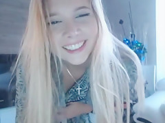 Sexy blonde in c-thru bikini teasing her pert boobs
