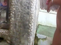 Nudist women filmed in secret at the shower cabins at beach