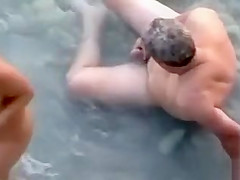 Eating out his wife in the sea water