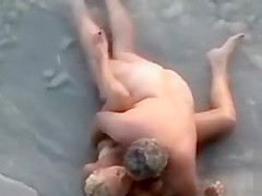 Eating out his wife in the sea water