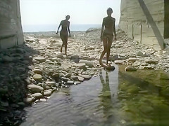 Nude teen beauties splash in the river