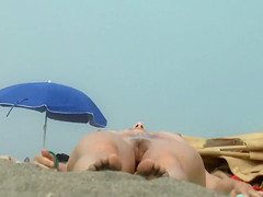 Nudist hairy pussy filmed voyeur at the beach