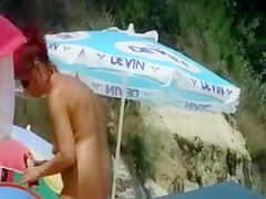 At Beach Spying on Mature Nudist Woman