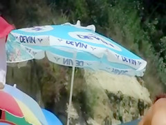 At Beach Spying on Mature Nudist Woman