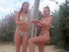 Super horny girls masturbating at the beach