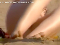 Cute curly hair amateur naked on the beach