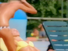 Topless skinny girl looks sexy at the water park
