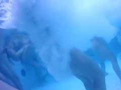 Nudists in the pool get filmed underwater