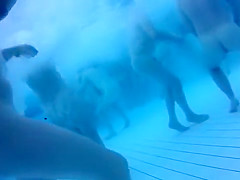 Nudists in the pool get filmed underwater