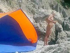 Voyeur Camera at a Secluded Beach Place Naked Woman Filmed