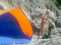 Voyeur Camera at a Secluded Beach Place Naked Woman Filmed
