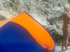 Voyeur Camera at a Secluded Beach Place Naked Woman Filmed