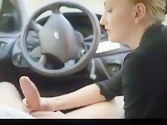 Juicy girl giving an amazing handjob in car