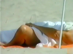 Elder lady sunbaths her saggy twins