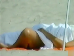Elder lady sunbaths her saggy twins