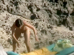 Spying at the Beach Nudist Wife Fingered in Her Pussy