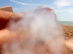 Reading the book and stroking the erected cock