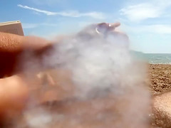 Reading the book and stroking the erected cock