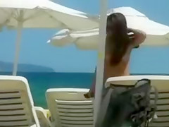 Voyeur on the Beach Topless Girls Filmed