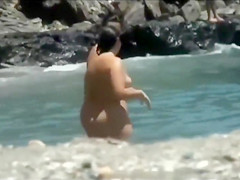 Nudist women at the beach caught voyeur