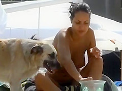 Nice natural boobs on a smoking babe at the pool