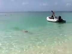 Naked models have fun on a beach vacation