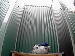 Dark haired bombshell takes a cold shower