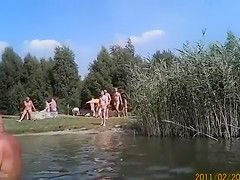 Nudist weekend at the lake with lots of naked people