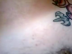 Husband filming nudist wife sunbathing in the backyard