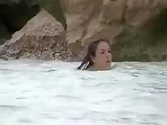 Brunette Woman with Hairy Pussy Nude at the Beach