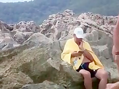 Brunette Woman with Hairy Pussy Nude at the Beach