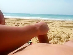 Vigorous wife gives her husband a good handjob