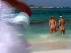 Flawless naked lasses take a dip in the ocean