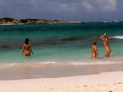 Flawless naked lasses take a dip in the ocean